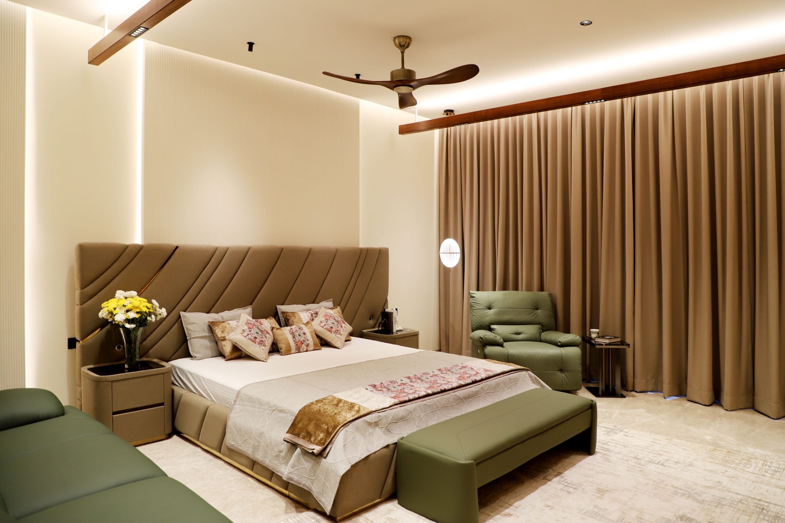 A beautifully designed modern luxury bedroom with elegant lighting and decor.